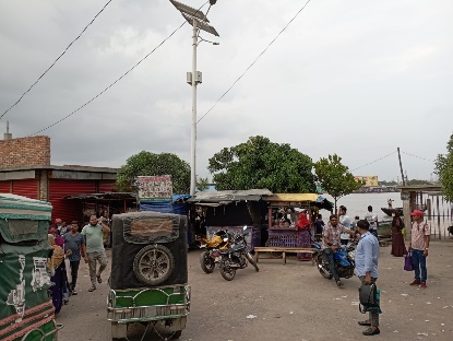 Street activity with people and vehicles at Rupsha Ghat, Khulna